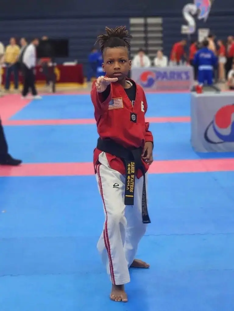 student performing at a martial arts tournament