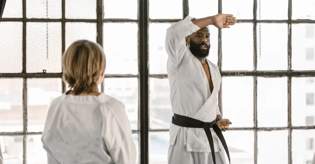 Instructor demonstrating self-defense basics during martial arts lesson